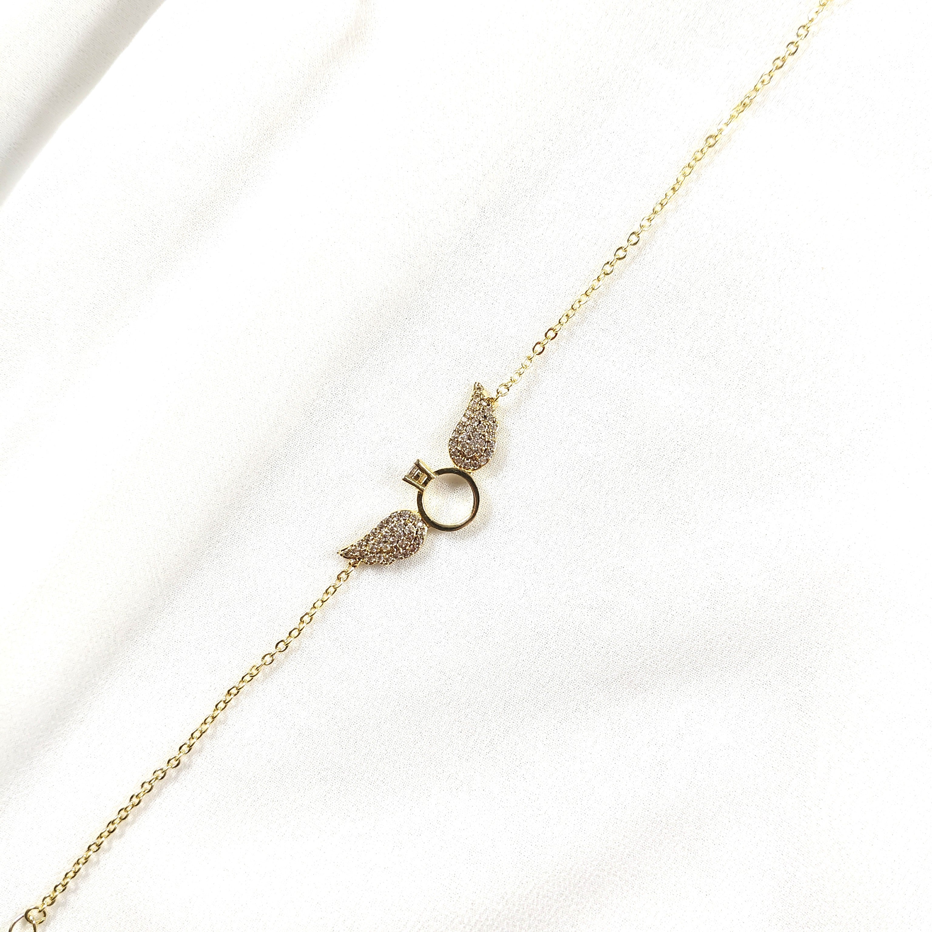 Bracelet Fantaisie Doré “Bague Ailée” Strassée