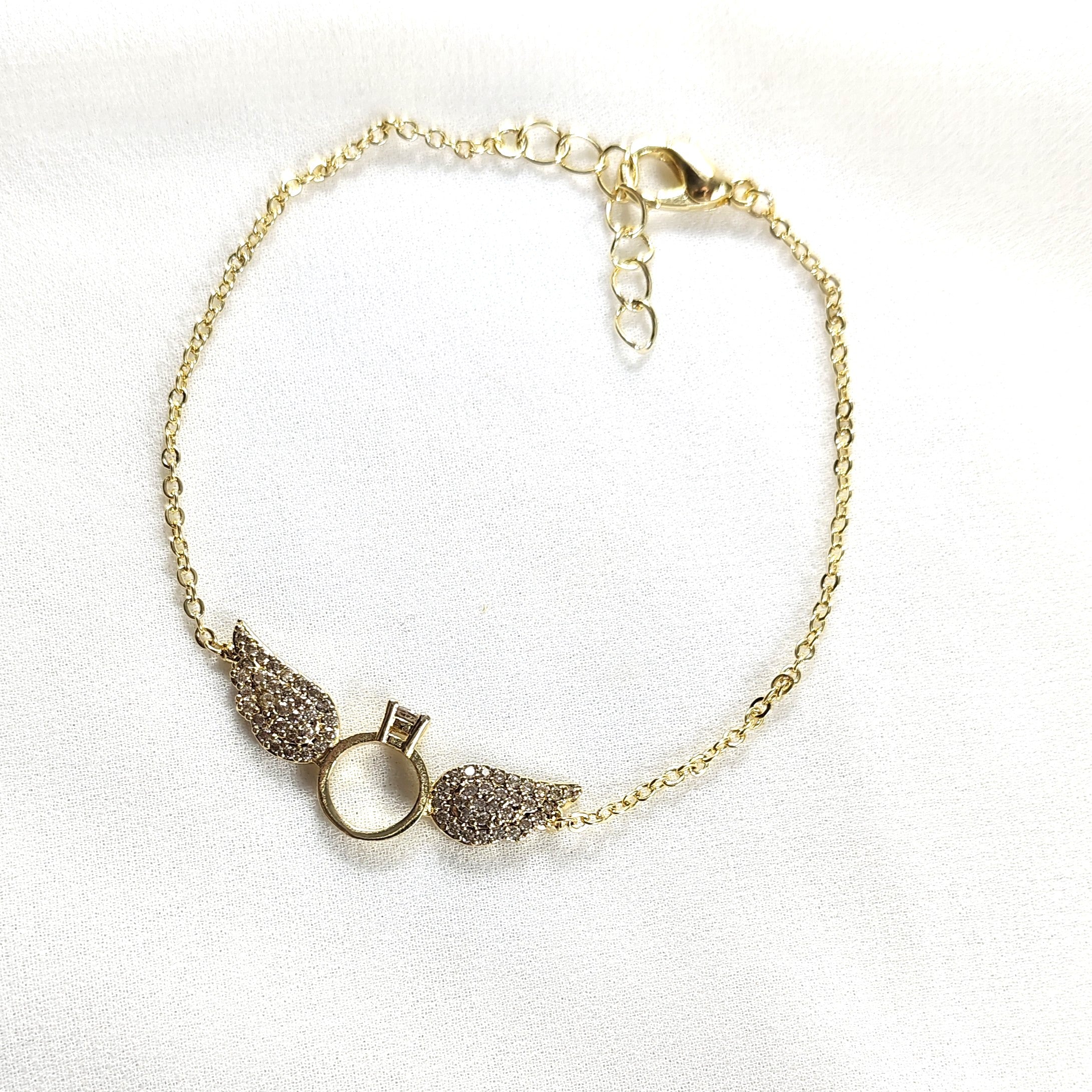 Bracelet Fantaisie Doré “Bague Ailée” Strassée