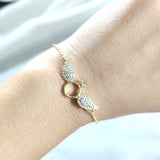 Bracelet Fantaisie Doré “Bague Ailée” Strassée