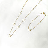 Parure en Acier Inoxydable Doré avec Perles Blanches