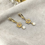 Boucles d’Oreilles Fleur Perle en Plaqué Or
