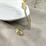 Parure Infinity Élégance – Bague & Bracelet en Plaqué Or