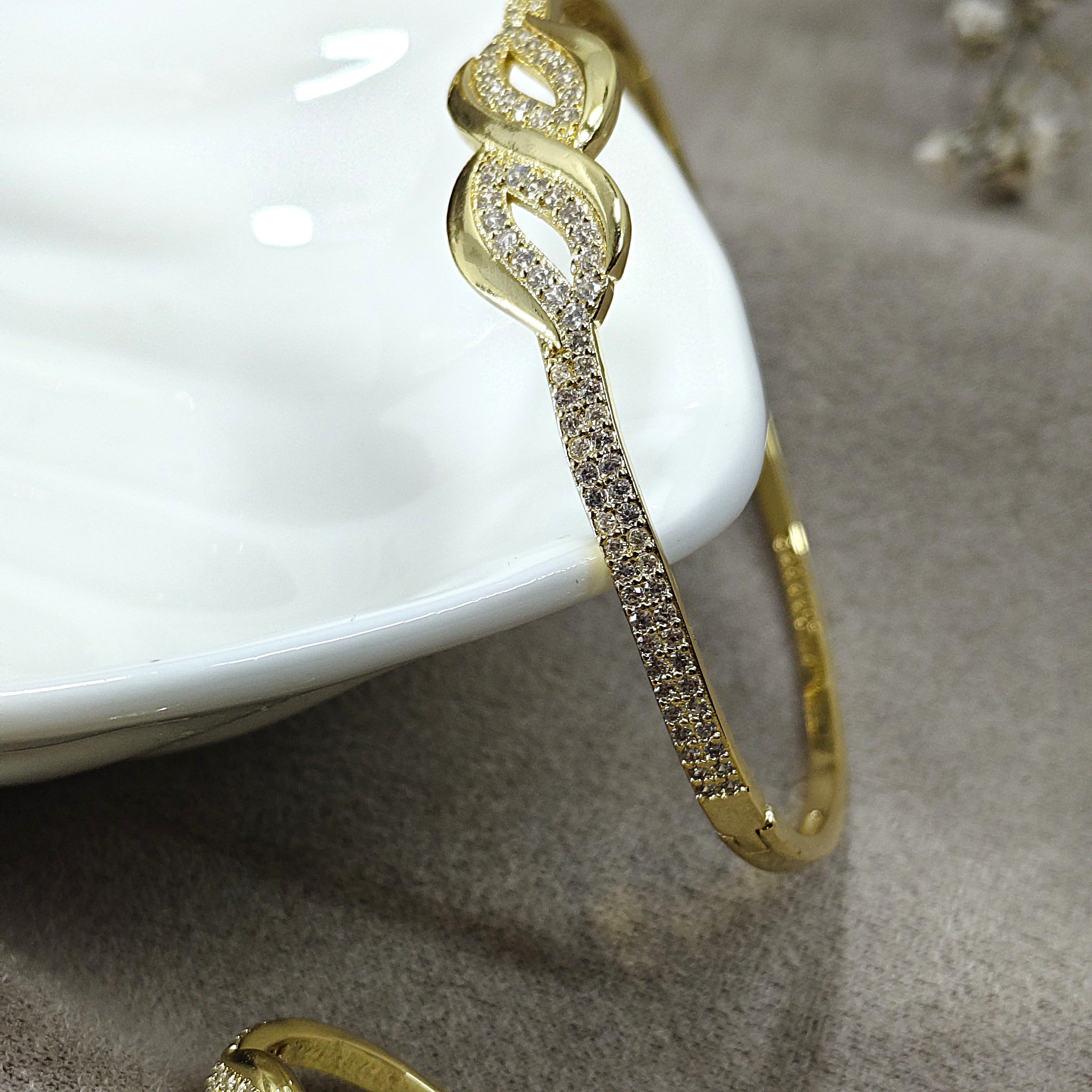 Parure Infinity Élégance – Bague & Bracelet en Plaqué Or