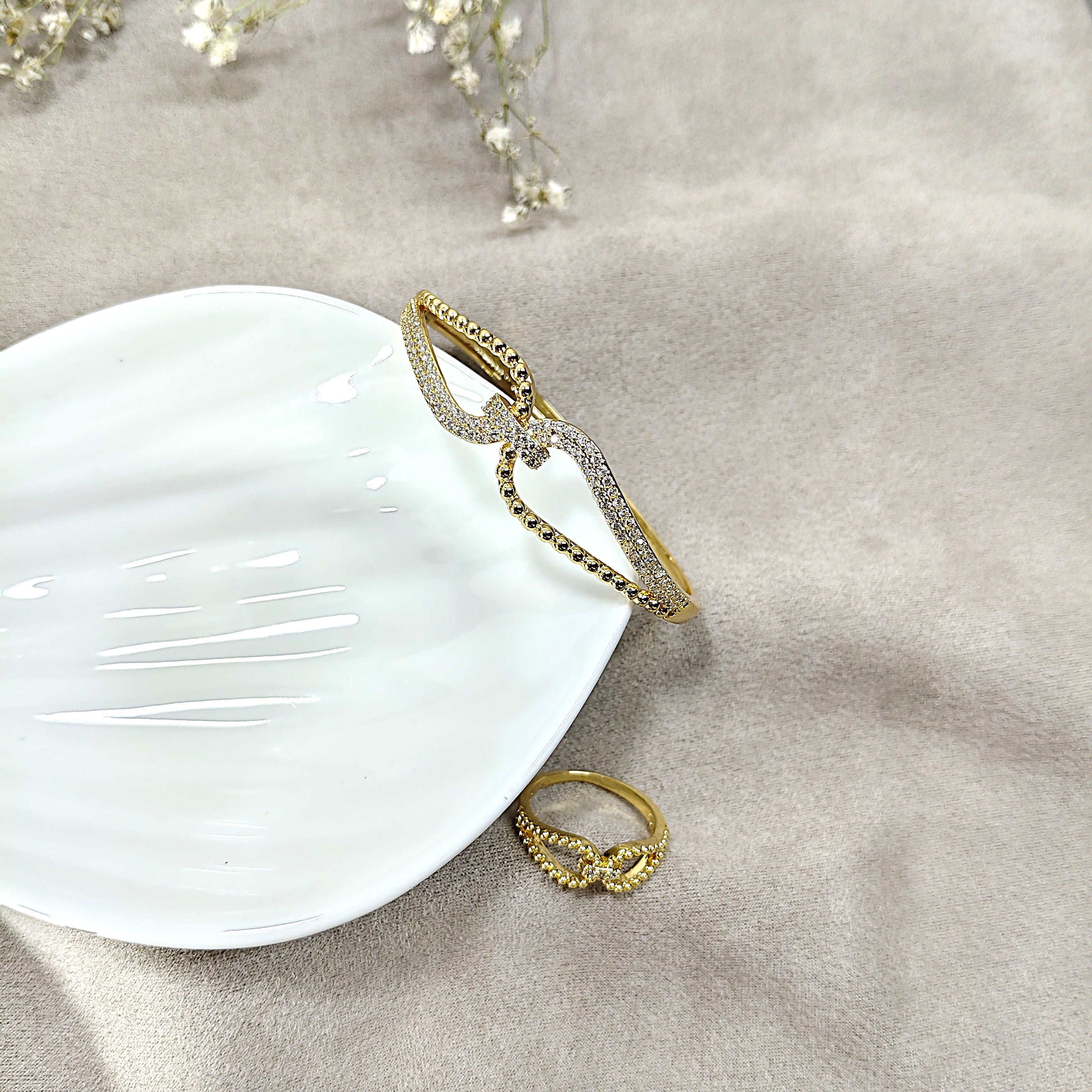 Parure Infinity Élégance en Plaqué Or – Bague & Bracelet Sertis de Cristaux