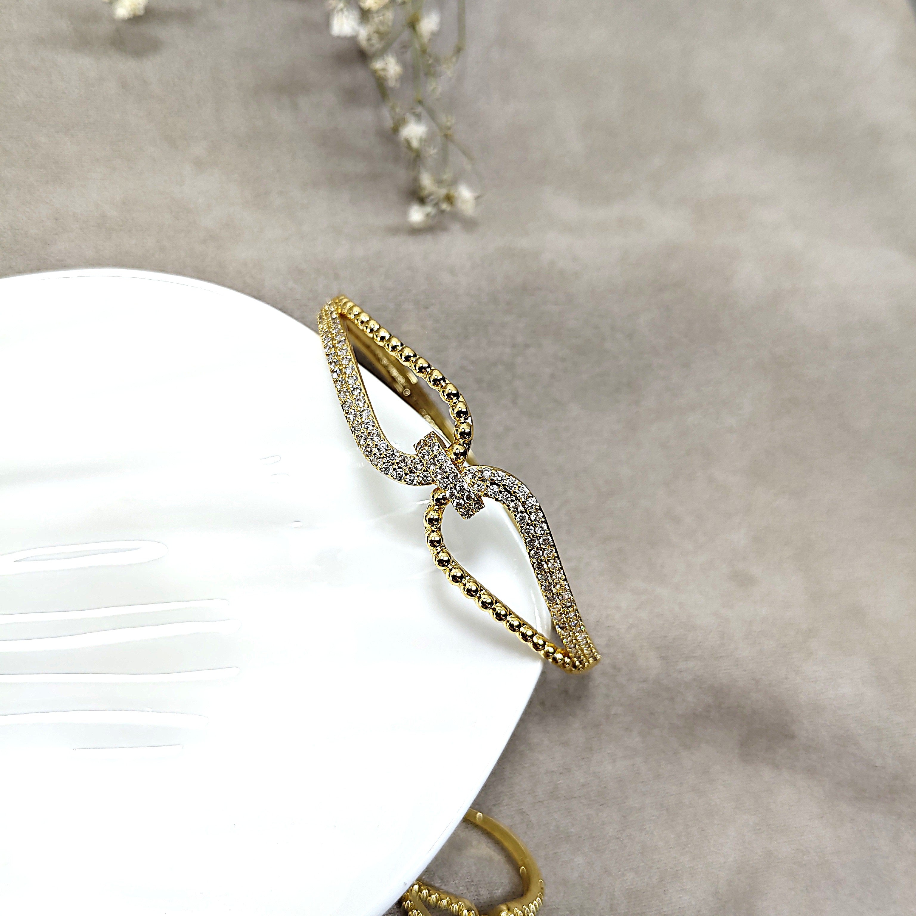 Parure Infinity Élégance en Plaqué Or – Bague & Bracelet Sertis de Cristaux