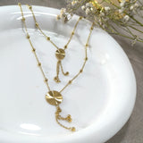 Collier Doré Double Médaillon Soleil – Élégance Multi-Rangs