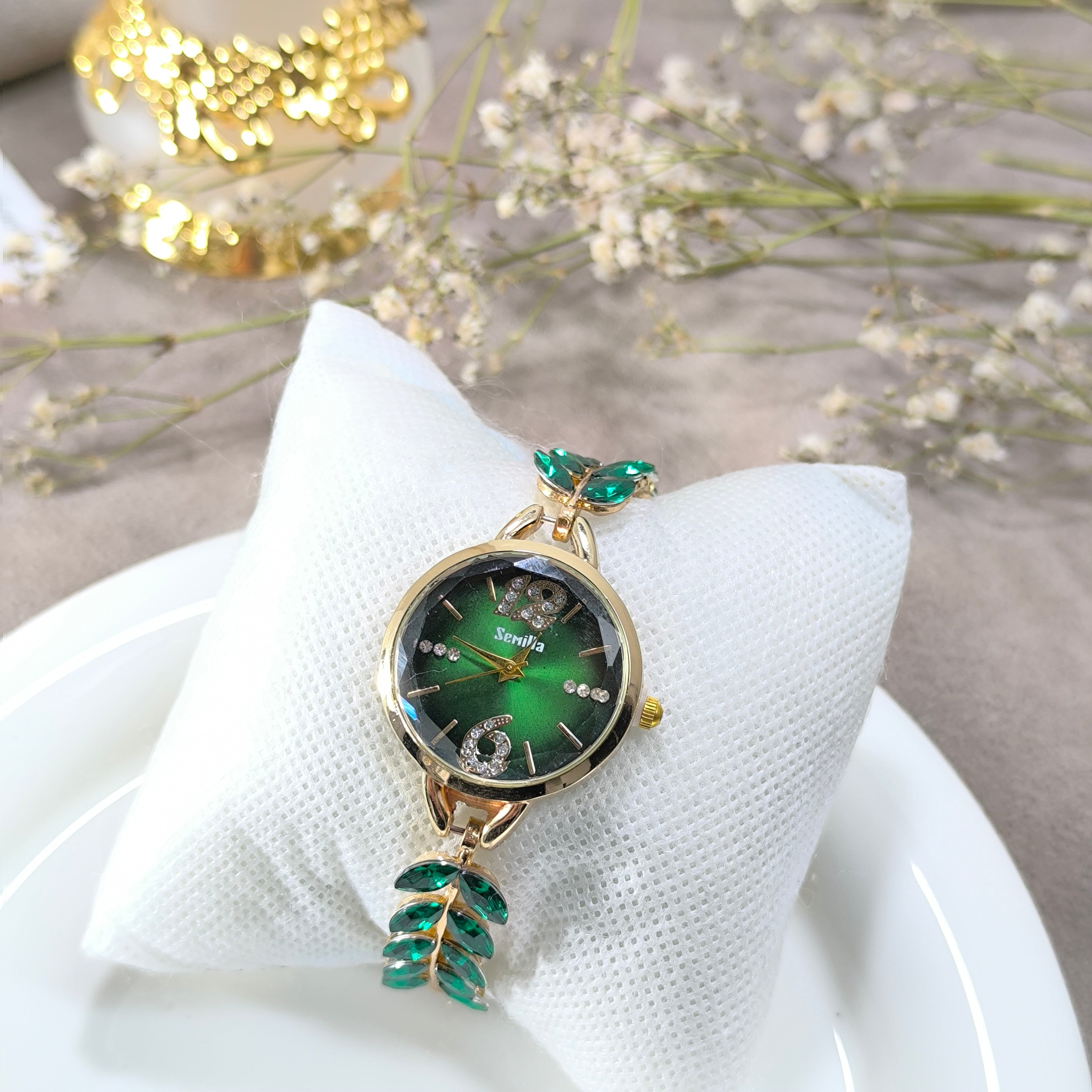 Montre Femme Émeraude Élégance – Bracelet Doré Feuilles Cristal