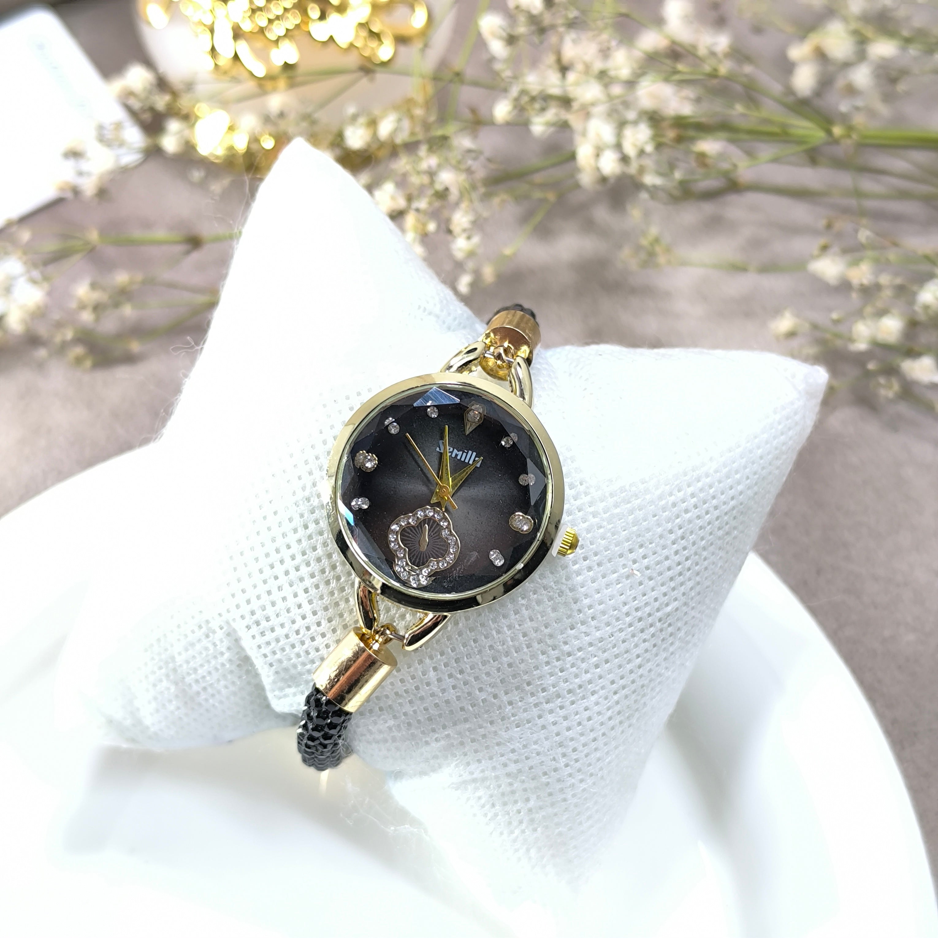 Montre Femme Élégance Noire & Dorée – Bracelet Tressé Chic