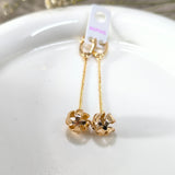 Boucles d’Oreilles Pendantes Fleur Dorée – Élégance Chic & Raffinée xuping