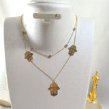 Collier Doubleet boucle  Chaîne Hamsa Doré – Élégance & Protection