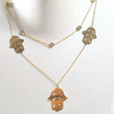 Collier Doubleet boucle  Chaîne Hamsa Doré – Élégance & Protection