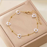 Parure Fleur Perle Dorée – Collier & Bracelet en Acier Inoxydable
