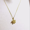 Collier Fleur Doré en Acier Inoxydable – Élégance Brillante