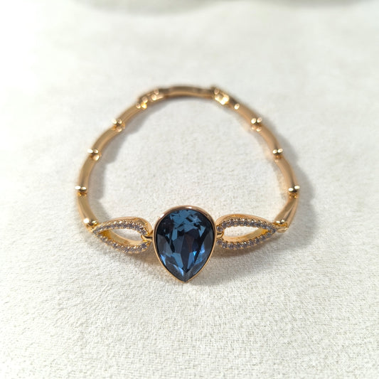 Bracelet élégant en xuping plaqué or avec cristal Swarovski bleu en goutte