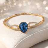 Bracelet élégant en xuping plaqué or avec cristal Swarovski bleu en goutte