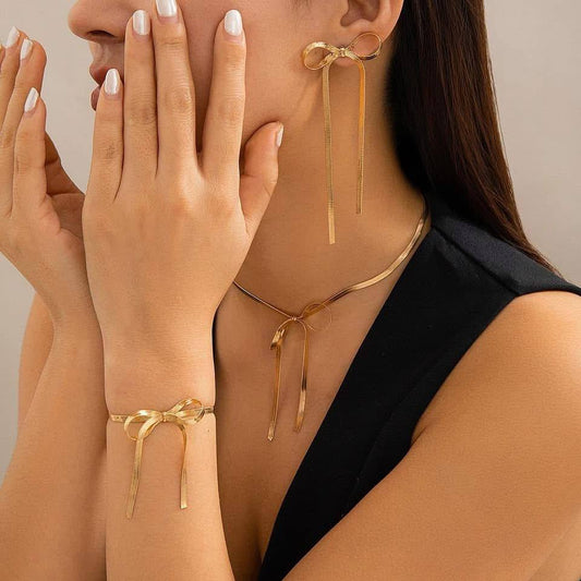 Parure Élégance Dorée – 4 Pièces en Acier Inoxydable